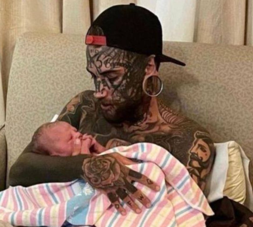 One cute thing after another: a 24-year-old man with a lot of tattoos gets rid of them for his daughter.